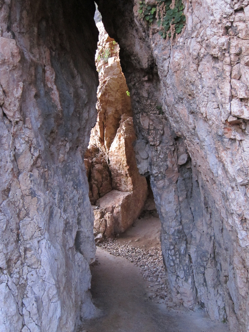 Passageway through the cliffs to Pod Kovač